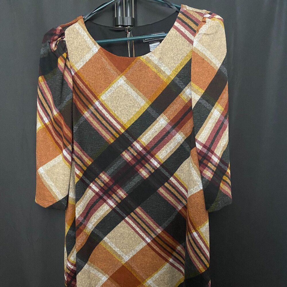 Brand New . size PM but too big for me